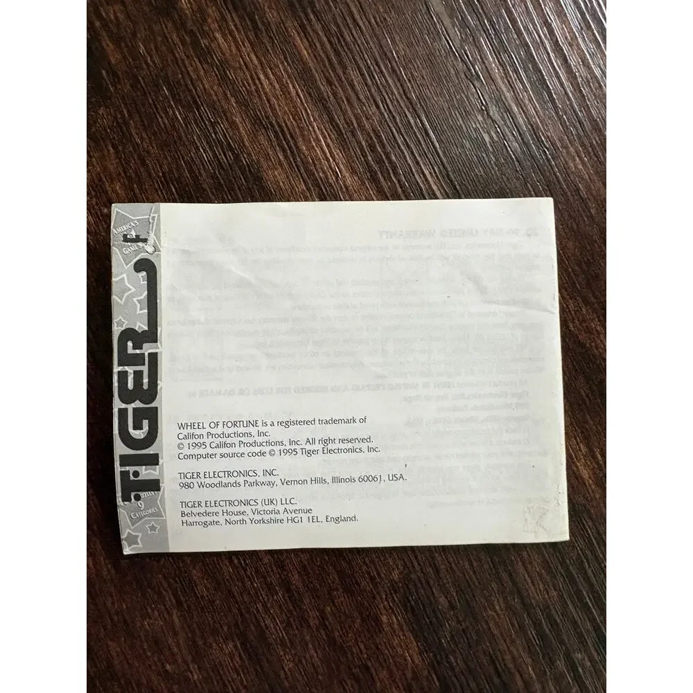 1995 Tiger Electronics Wheel Of Fortune Handheld LCD Video Game Plus Cartridge 1